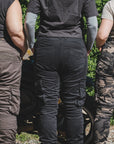 three women of difference sizes demonstrating the motorcycle cargo pants in different colous