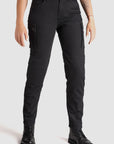 legs of a woman wearing black cargo motorcycle pants