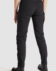 back legs of a woman wearing black cargo motorcycle pants