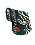 A multicolor patterned neck gaiter featuring a mix of tropical floral designs, zebra stripes, checkered patterns, and the word 'MOTOGIRL'