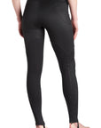 Woman's legs wearing armoured motorcycle leggings from Pando Moto