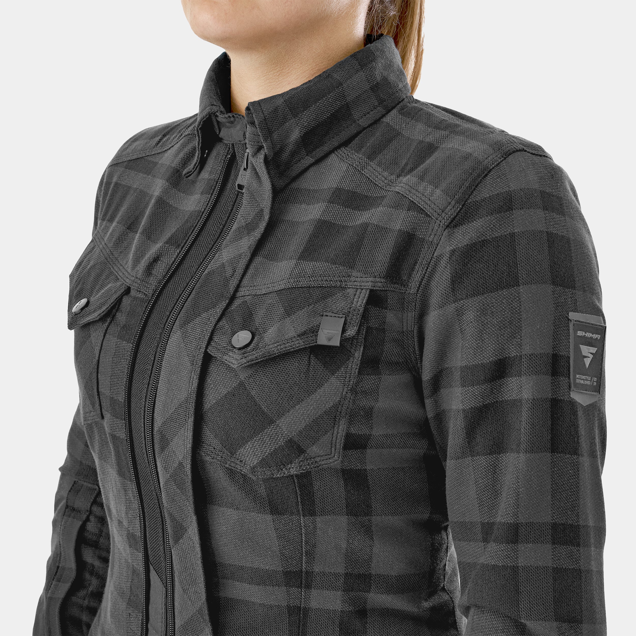 Black and gray plaid shirt with a brand logo on a white background