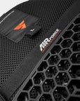Black protective gear with honeycomb design and Air Force logo on a gray background