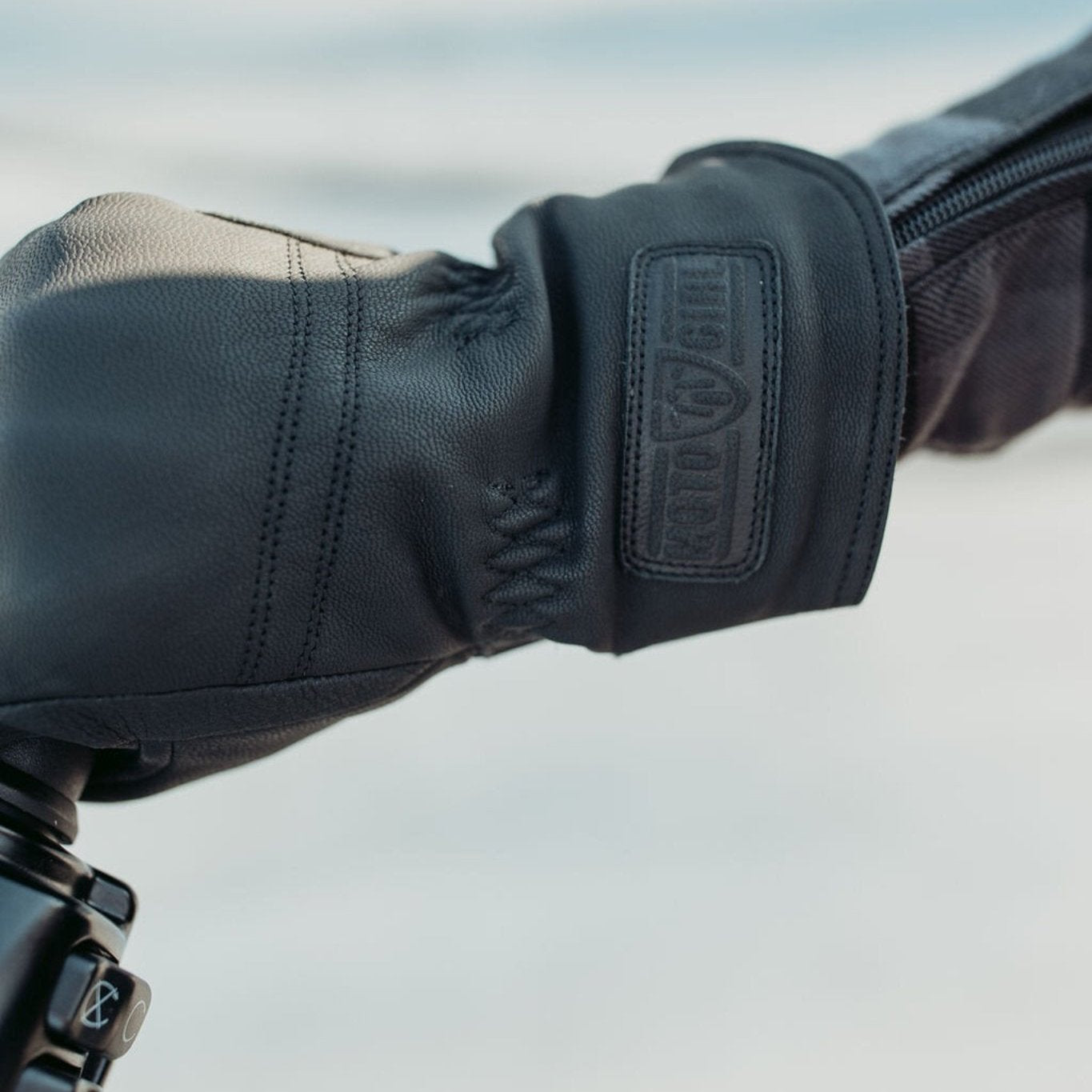 Black Nandi winter gloves from MotoGirl with logo  the wrist