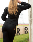 blond woman wearing a black jacket and black mc leggings from moto girl 