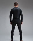 a back of a man wearing Pando Moto black base layer shirt and leggings 