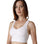 A dark-haired woman wearing a white sports bra with wide straps from Tremonte. 