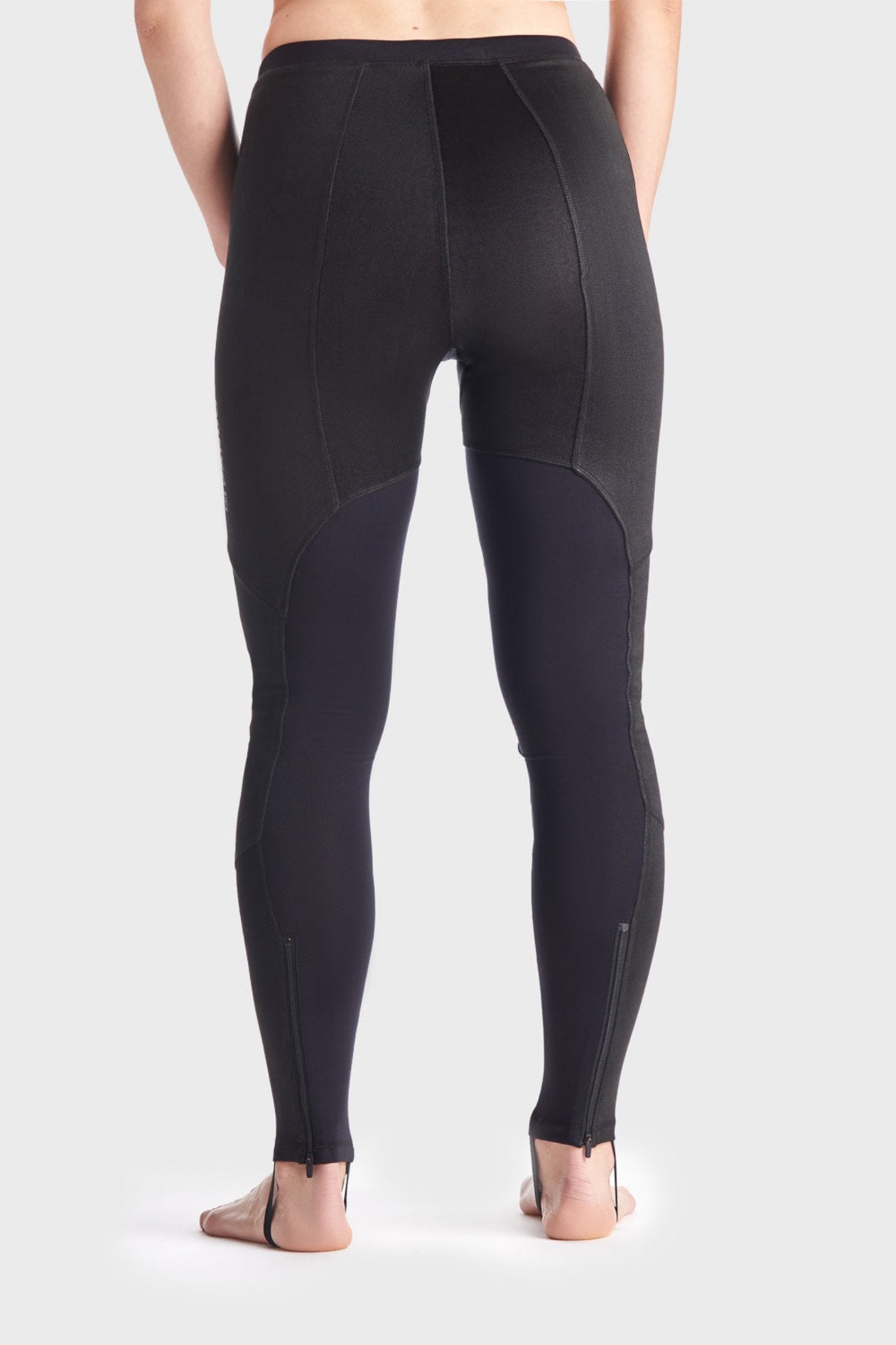 Woman&#39;s legs and bottom wearing Pando Moto SKIN AAA armoured base layer leggings in black