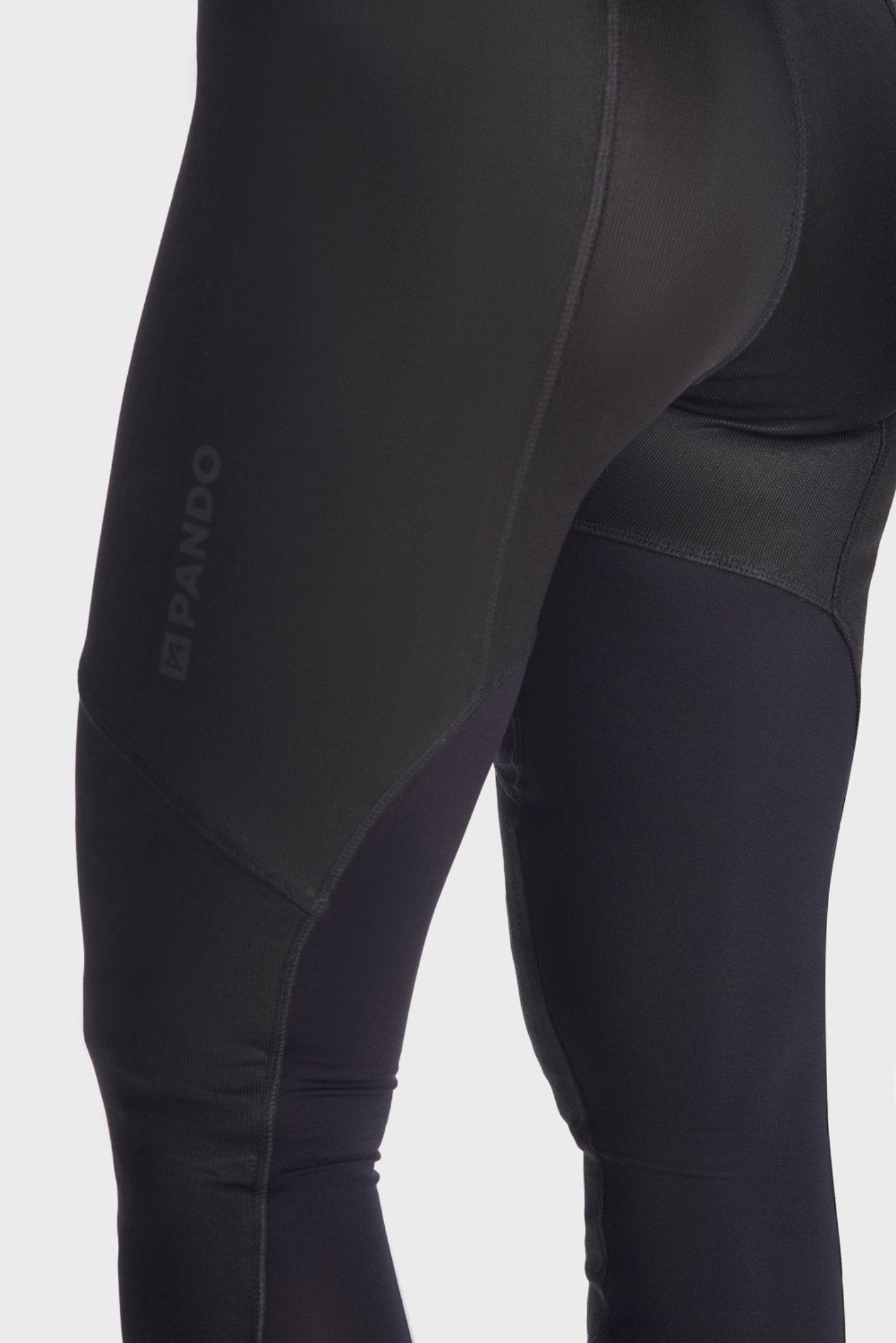 A close up of woman tighs wearing Pando Moto SKIN AAA armoured base layer leggings in black