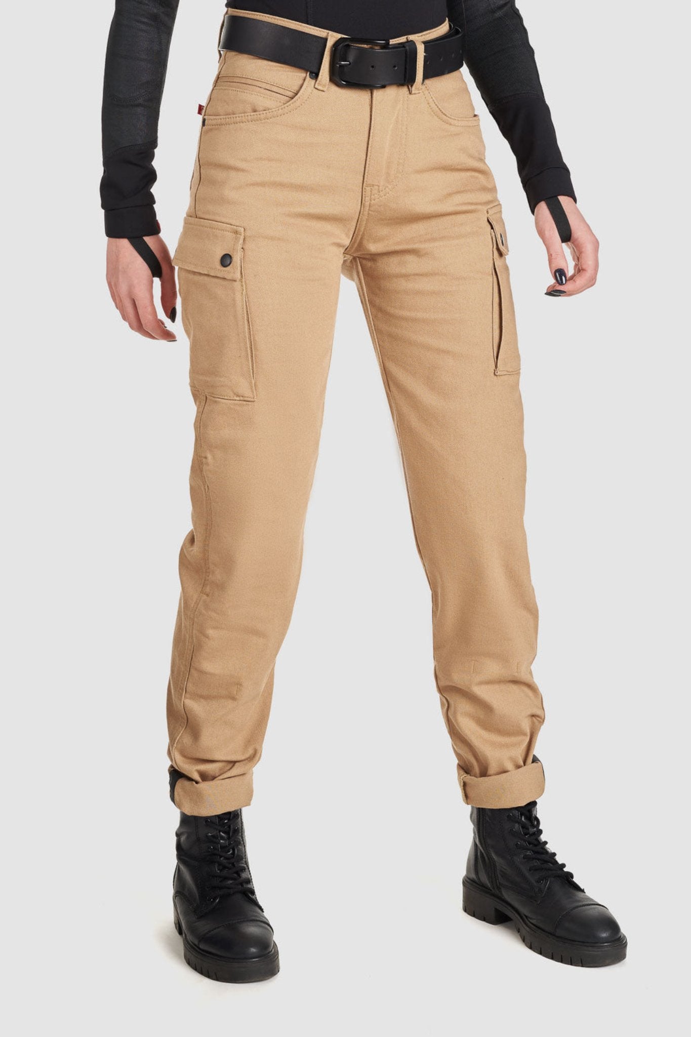 woman&#39;s lower body wearing beige mc cargo pants for ladies from pando moto 