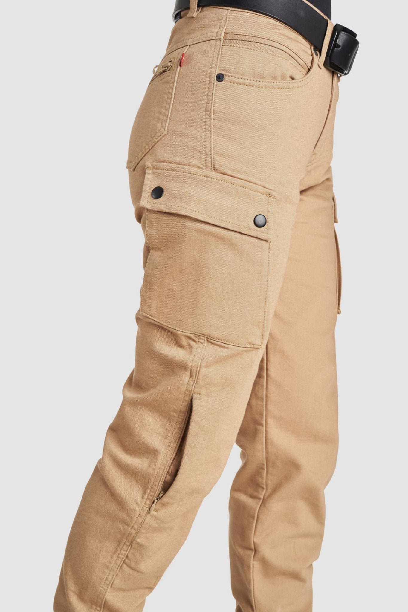 A close-up of the cargo pocket on the beige women&#39;s MC pants from the side.