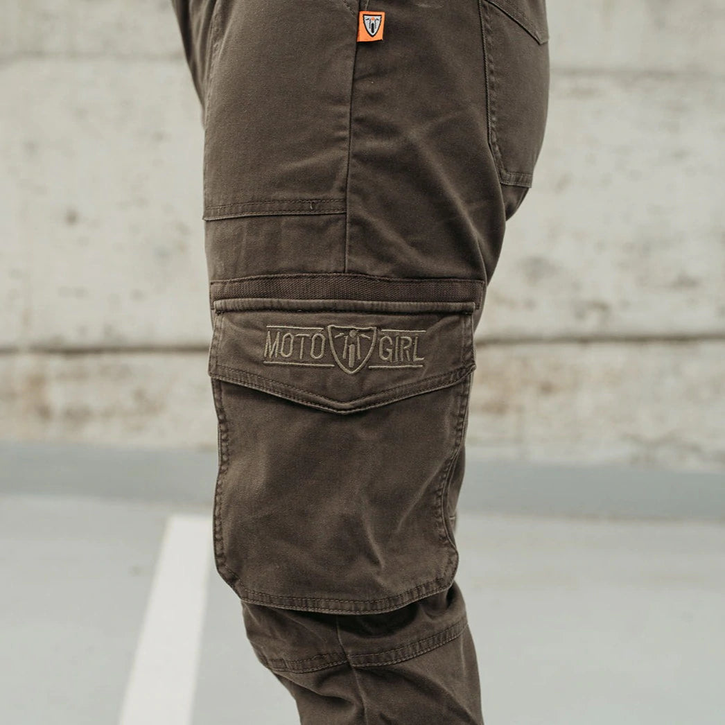 A close up of the pocket on olive green women&#39;s motorcycle pants from Motogirl