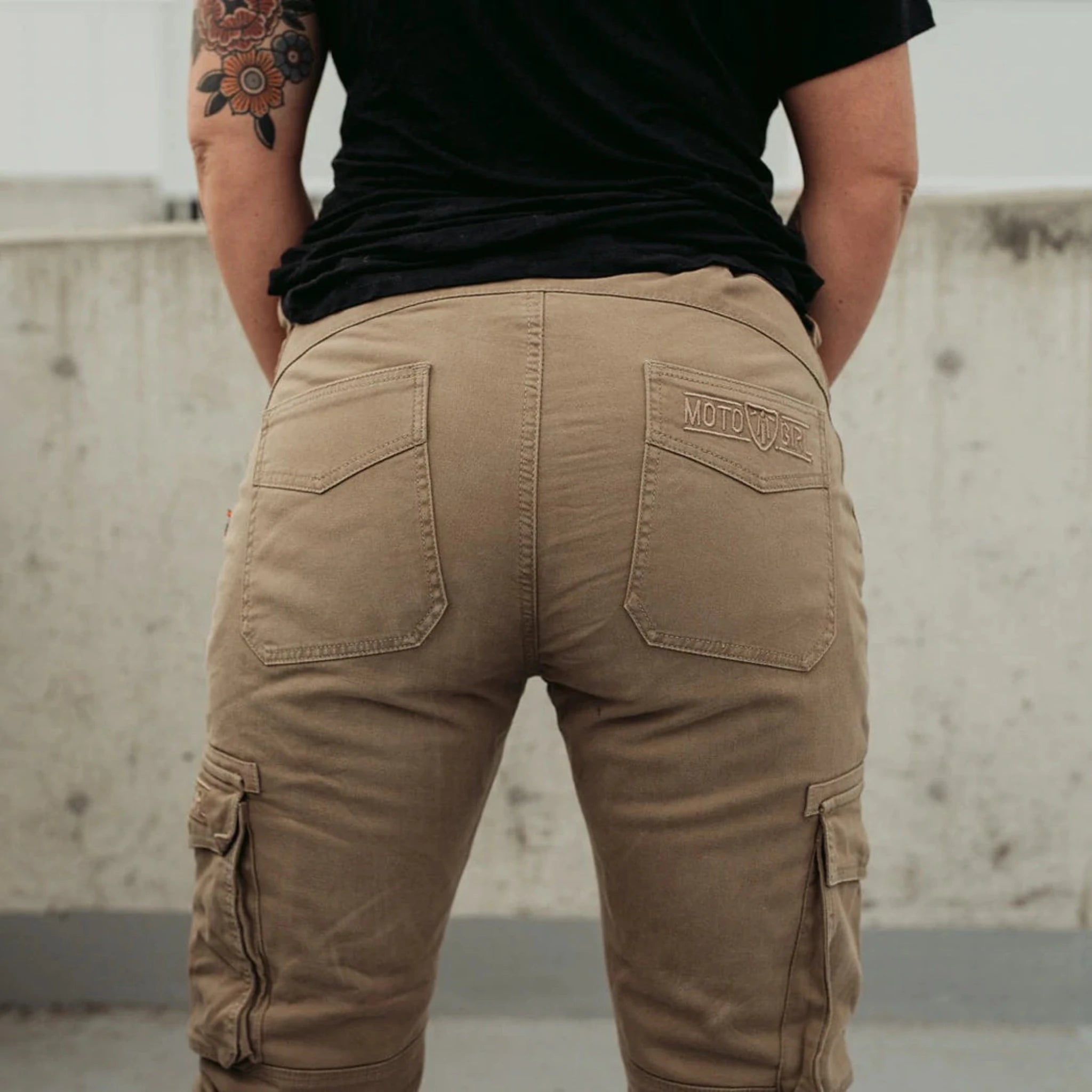 A woman&#39;s bottom wearing beige women&#39;s motorcycle cargo pants from mOTO gIRL 