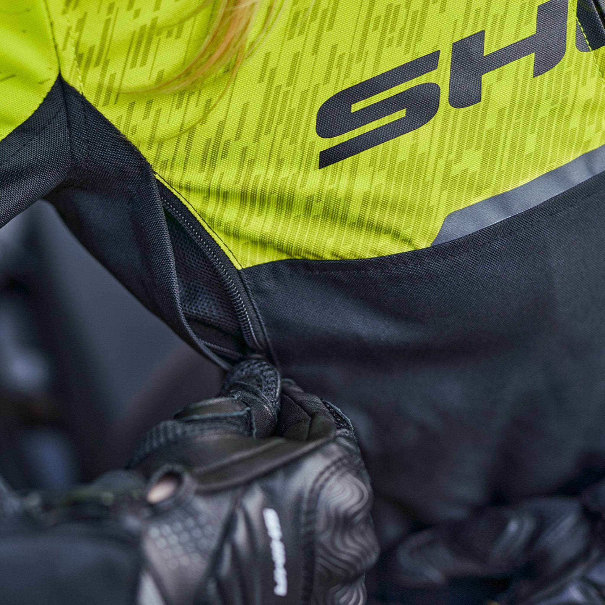 Close up of fluo color women&#39;s motorcycle jacket from SHIMA