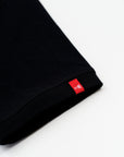 The close up of the sleeve of a black motorcycle t-shirt