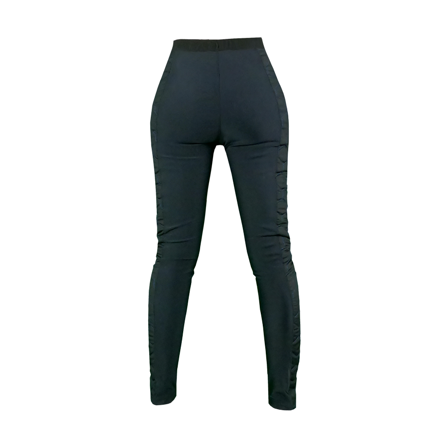 Women's motorcycle leggings from exagon66 in black and green from the back 